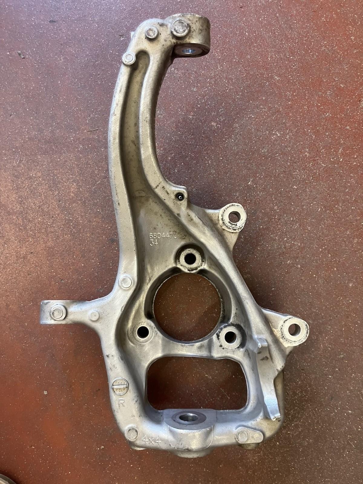 Passenger Side Steering Knuckle, 2009-2024 Ram 1500 and 1500 Classic, 4X4, 68044704AD