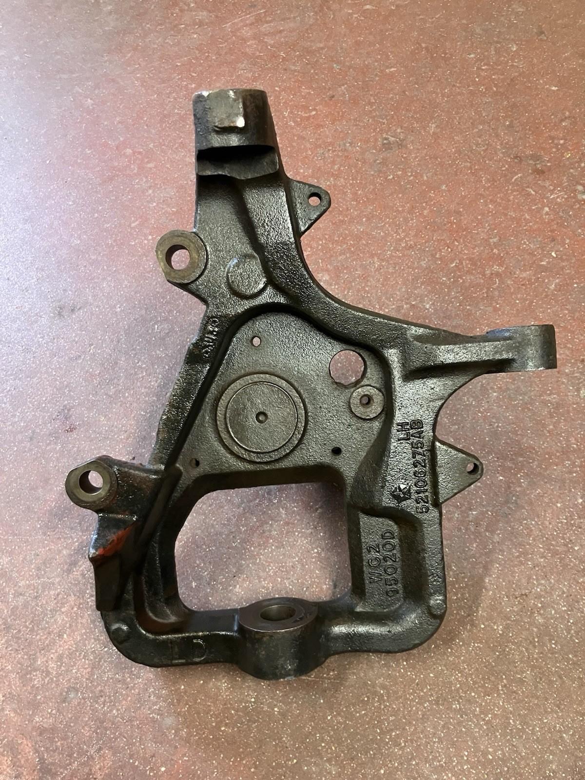 LH 4X2 Spindle Steering Knuckle 2000-01 Ram 1500 P/N 52106425AA