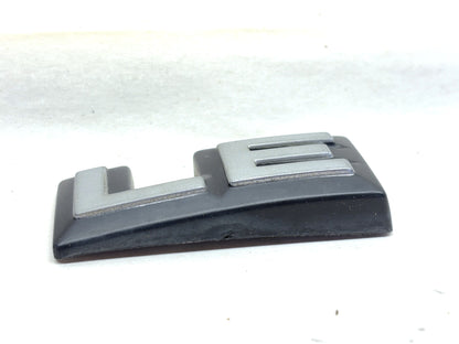 1991-93 Dodge Pickup Left-hand "LE" Emblem